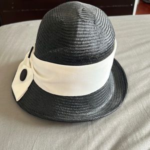 100% straw hat with white trim